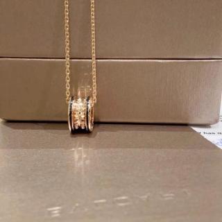 Bvlgari Rose Gold Spiral Circle Pendant Necklace – Elegant Luxury Jewelry